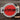 Person holding a round sign with 'Animart' text against a brown background